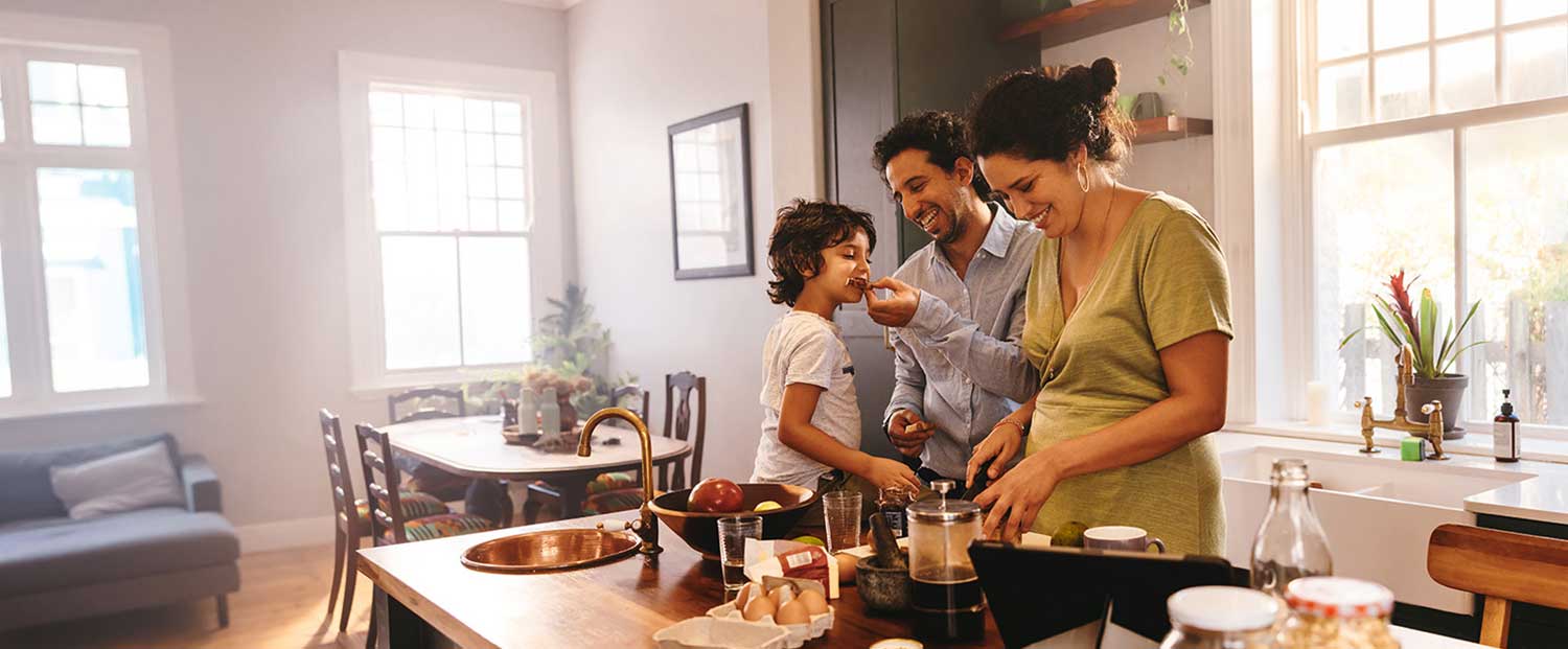 Featured - Generational family with baby learning to walk